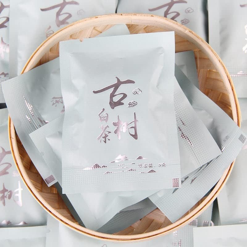 Thé blanc du Yunnan Miel de biscuit Thé blanc parfumé Feuilles de thé des Alpes Arbre ancien Brique de thé blanc 500g 便捷包装云南白茶饼干蜜香老白茶